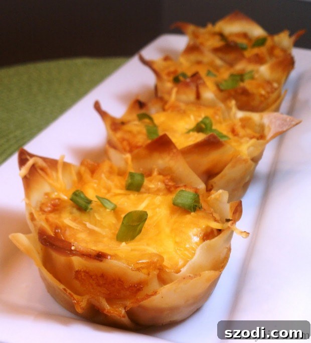 Freshly baked Hawaiian BBQ Wonton Cupcakes in a muffin tin