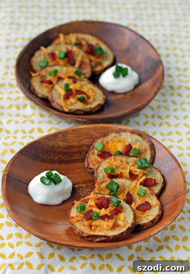Close-up of Freshly Garnish Loaded Potato Rounds with Scallions