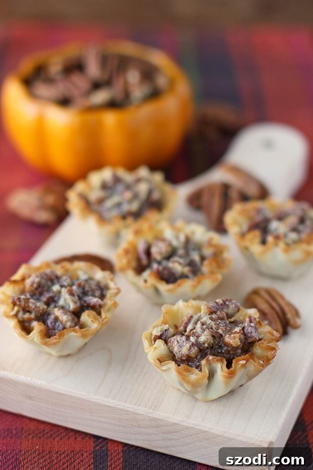 Close-up of freshly baked Pecan Pie Bites on a cooling rack
