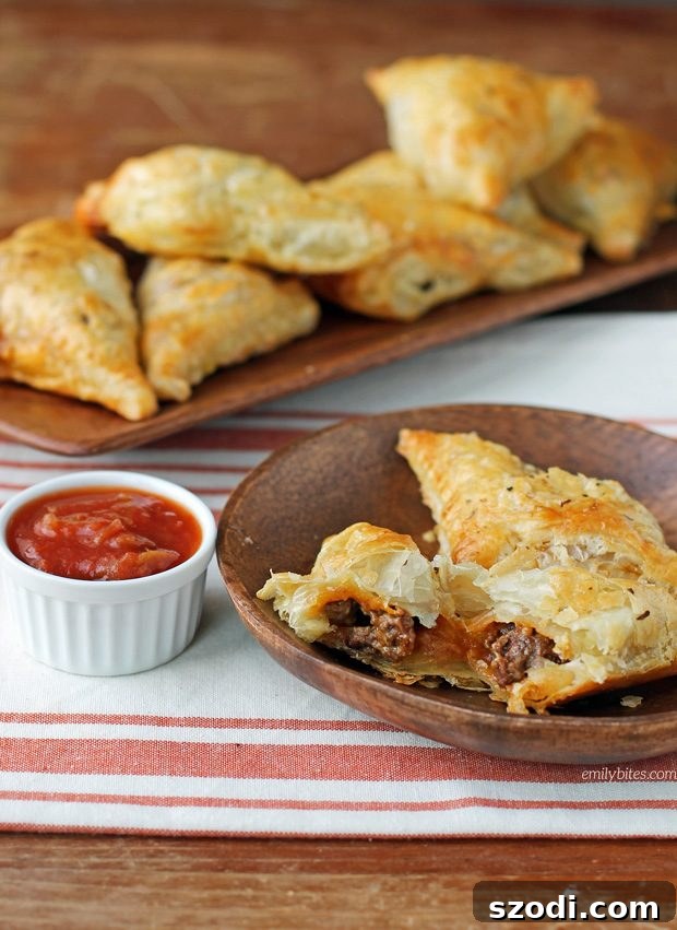 Delicious golden brown Taco Puff Pockets on a serving platter