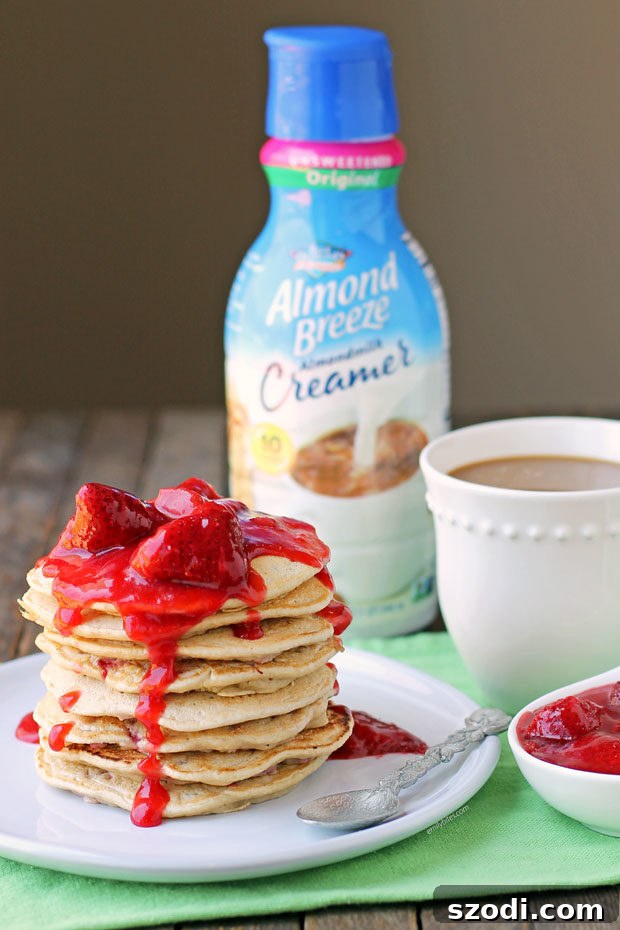 Strawberry Almond Cream Pancakes with coffee