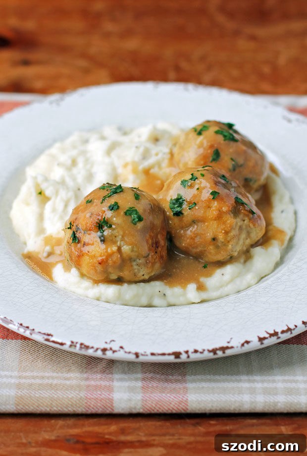 Delicious Swedish Turkey Meatballs with creamy mashed potatoes, a lightened-up comfort food classic