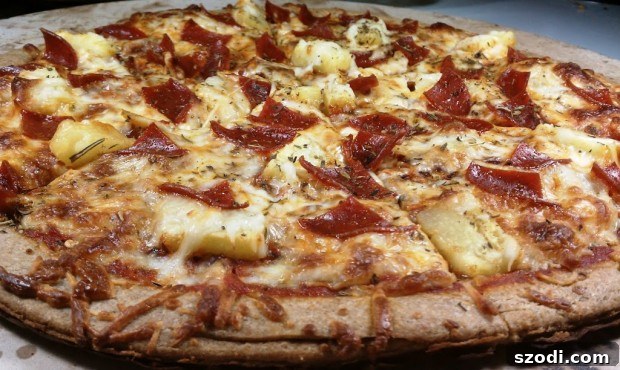 Closeup of freshly baked Pepperoni and Pineapple Pizza