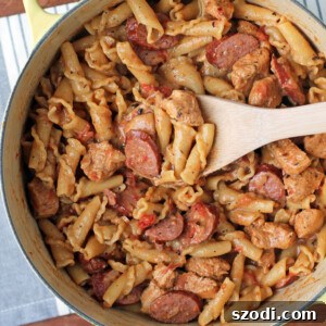 One-Pot Cajun Chicken and Sausage Pasta in a pot, ready to be served.