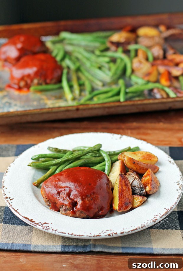 Sheet Pan Meatloaves with Roasted Potatoes and Green Beans on a plate