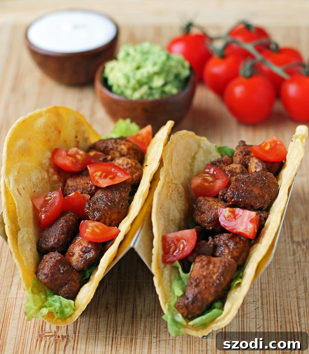 Easy Chicken Tacos in a taco holder, ready to be enjoyed