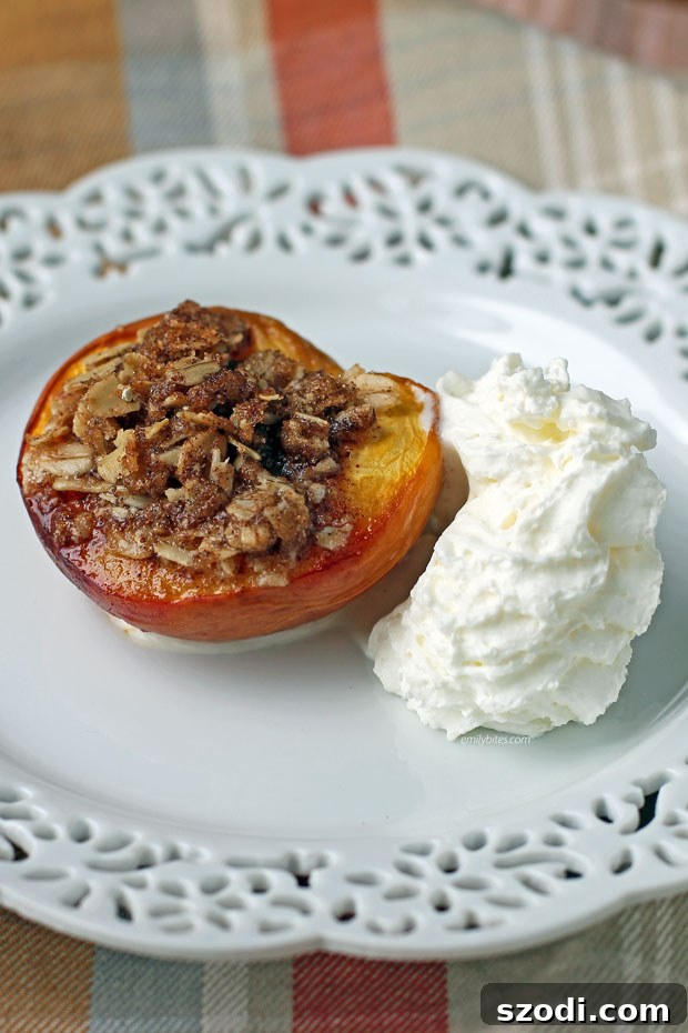 Baked Peaches with Crisp Topping with whipped cream