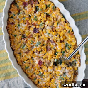 Creamy Corn with Bacon and Jalapenos being scooped
