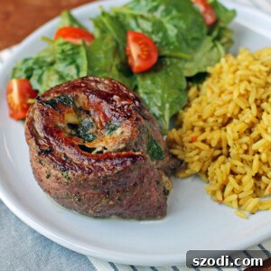 Garlic Parmesan Flank Steak Pinwheel with salad and rice