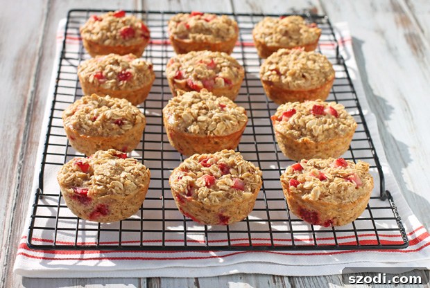 Grab-and-Go Strawberry Banana Oatmeal Cups 3 Close-up of baked oatmeal with strawberries and bananas