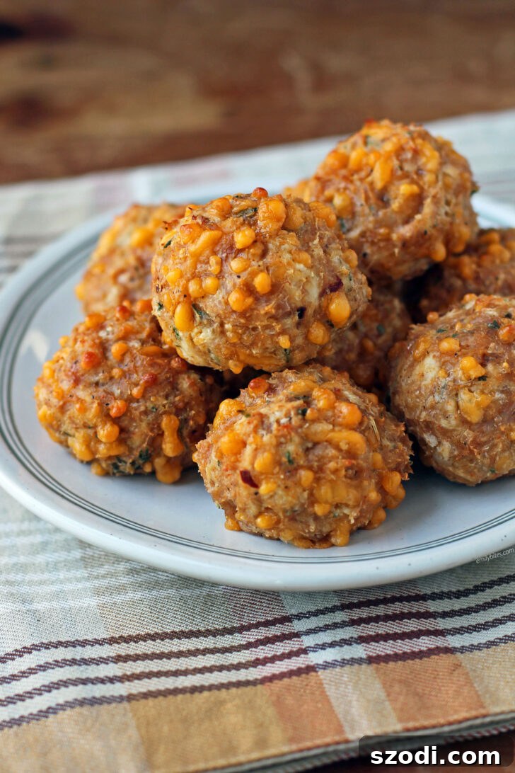 Delicious and healthy Bisquick Chicken Sausage Balls stacked on a plate, ready to be served as an appetizer or snack