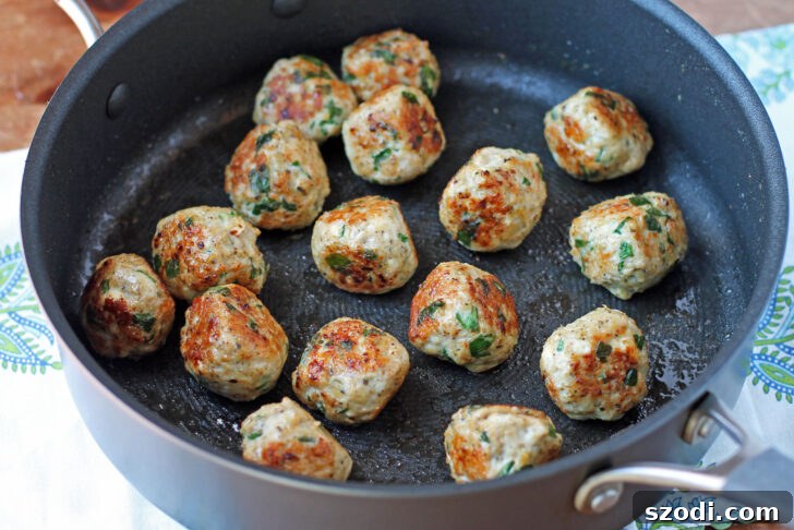 Greek Chicken Meatballs cooked in the pan